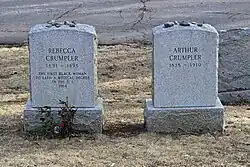 Rebecca's and Arthur's gravestones. Rebecca's gravestone is inscribed with "The first black woman to earn a medical degre in the U.S. 1864".