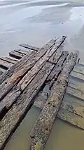 Remains of a shipwreck near Midge Bay, Pouto Peninsular