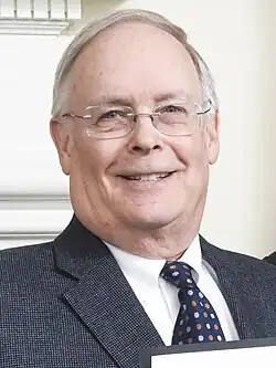 Robert R. Neall smiling in 2018