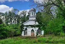 church described in next paragraph