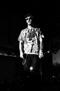 Salmo during a concert in Milan in 2014