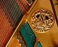 Signet of the firm of Schiedmayer & Sons on the cast plate of a grand piano