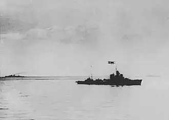 Artigliere, with HMS&nbsp;Orion and HMAS&nbsp;Sydney in the background, the morning after the engagement.