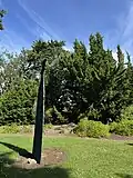 Side-on view of Ōwairaka, Statue of a Cloaked Woman, 2024