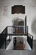Doors inside the church leading to the former burial chapel