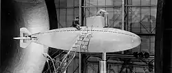 A scale model of the USS&nbsp;Albacore undergoing wind-tunnel testing. Apart from the rudder arrangements at its stern and the sail, its general shape is similar to that of the Ictineo II despite the designs being separated by nearly a century.