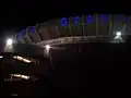 The front of the stadium at night