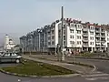 New residential blocks in Dobrinja and the Church of St. Basil of Ostrog.