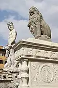 Neptune and the copy of Donatello's Marzocco, presenting the Florentine Lily (copy, original in the Bargello)