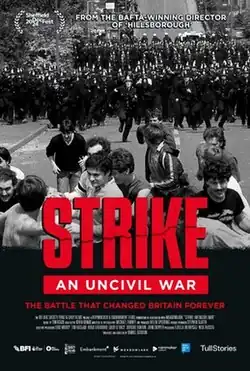 The film's poster. A black-and-white photograph with a small group of miners in the foreground with a large group of police offers charging forward towards them from a distance. Overlayed in red text is the film's title with the caption "The battle that changed Britian forever"