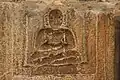 Image of Jina on pillar