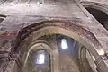 Interior archway with frescoes