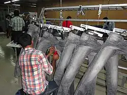 Tacking on jeans, which adds strength to high-stress areas