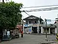 A tanod outside the barangay hall of Brgy. General Hughes, City Proper, Iloilo City