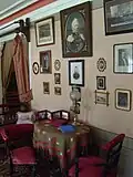 Portrait of Tchaikovsky's father and other family members in his reception room. The curtained doorway leads to his bedroom.