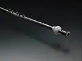 circa 1-500 A.D., Syria. Tibia of silver and ivory. A single pipe of a tibiae pares pair. End view, where the 2-reed bundle was insterted.