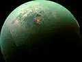 This false-color mosaic, made from infrared data collected by NASA's Cassini spacecraft, reveals the differences in the composition of surface materials around hydrocarbon lakes at Titan, Saturn's largest moon.