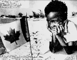 Turks and Caicos Islander with a Canadian Flag