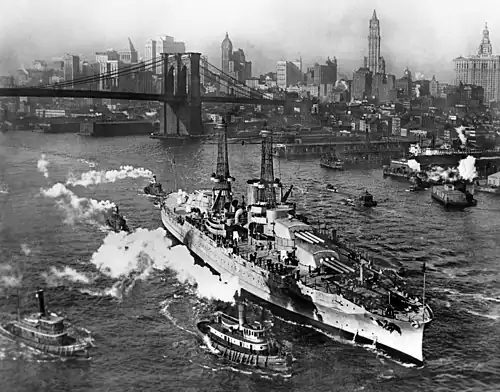 Hyperboloid mast towers were on the USS&nbsp;Arizona, a view from the Manhattan Bridge on the East River, in New York City, December 25, 1916.