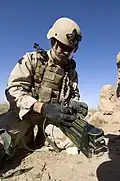 A demolition charge being assembled from multiple sticks of C-4