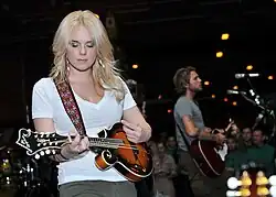 Cheyenne Kimball performing aboard the USS Abraham Lincoln (CVN-72) in 2010