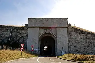 Built on the highest point of Portland, the Verne is surrounded by cliffs and a moat, with two entrances — one via a footbridge and one via this tunnel.