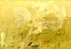 A yellow canvas with thin gestures of black and red on its lower half.