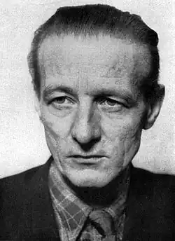 Monochrome portrait photograph of Rudolf Värnlund with a neutral expression