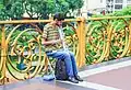 Street musician playing on the viaduct.