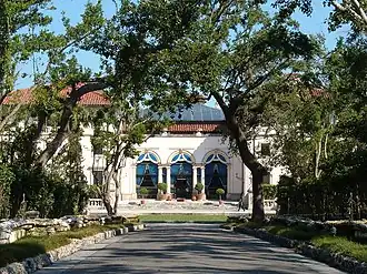 Entrance drive view of north Villa facade