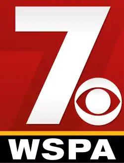 A large red rectangle with a yellow-orange border on the bottom, inside the rectangle is a large numerical 7 with the CBS eye logo at the bottom right, both in white; underneath the yellow-orange border is a black box with "WSPA" in a white serif font.