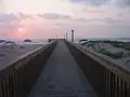 This walkway provides access to the beach from a condo.