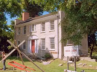 The Warren Hull House, at the intersection of Genesee Street and Pavement Road in Lancaster. It is Erie County's oldest surviving stone structure, built in 1810.