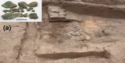 Xichengyi adobe building and bronze slabs.[3]