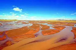The Tuotuo River, a headwater stream of the Yangtze River, known in Tibetan as Maqu, or the "Red River"
