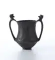 Kantharos with stylized horse engraved on brown body ceramic, excavations of 1896, Necropolis of Poggio Sommavilla.